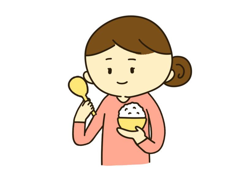 ご飯をよそう主婦